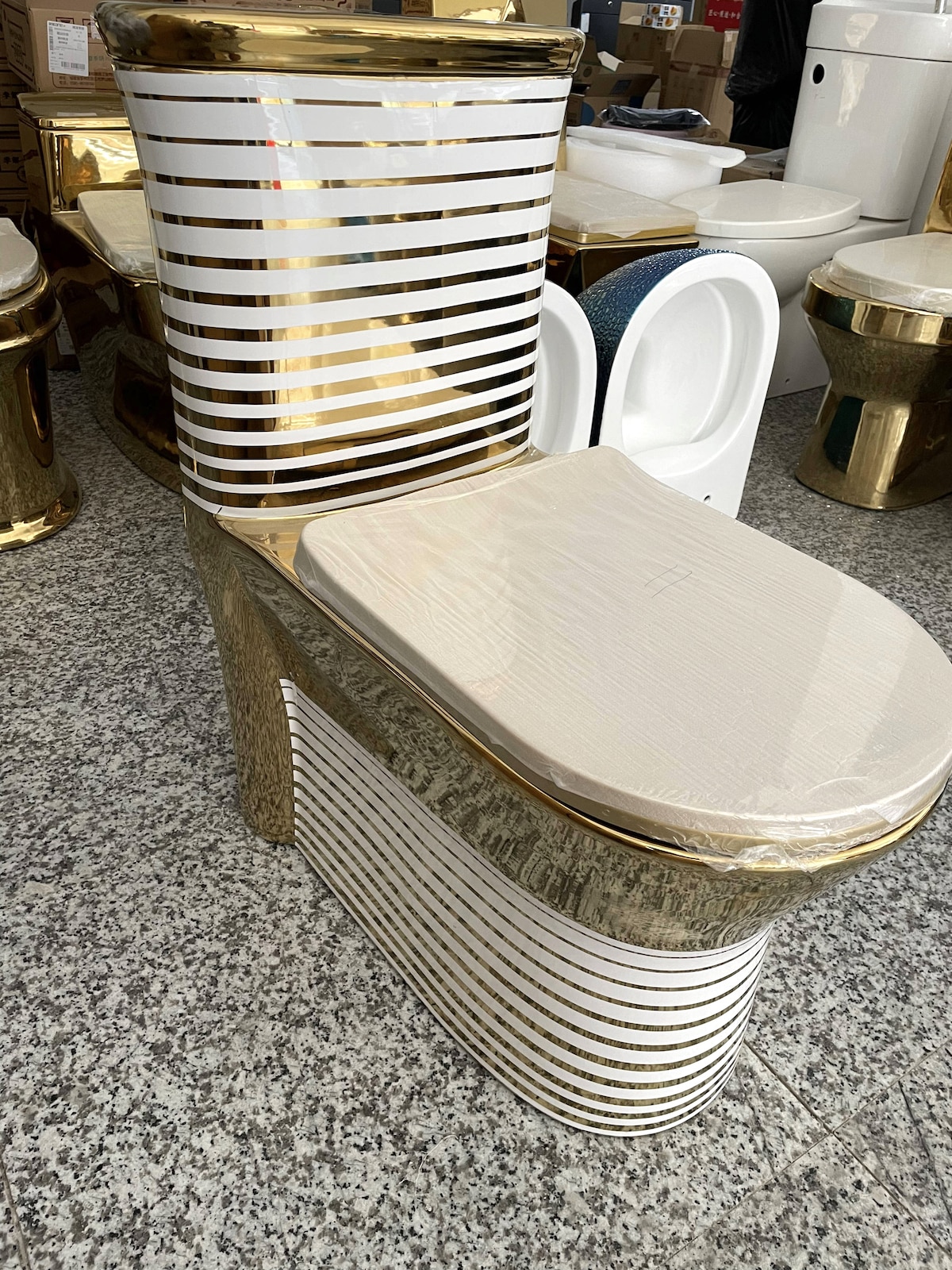 Gold Toilet With Horizontal White Patterns  -  Gold Toilets
