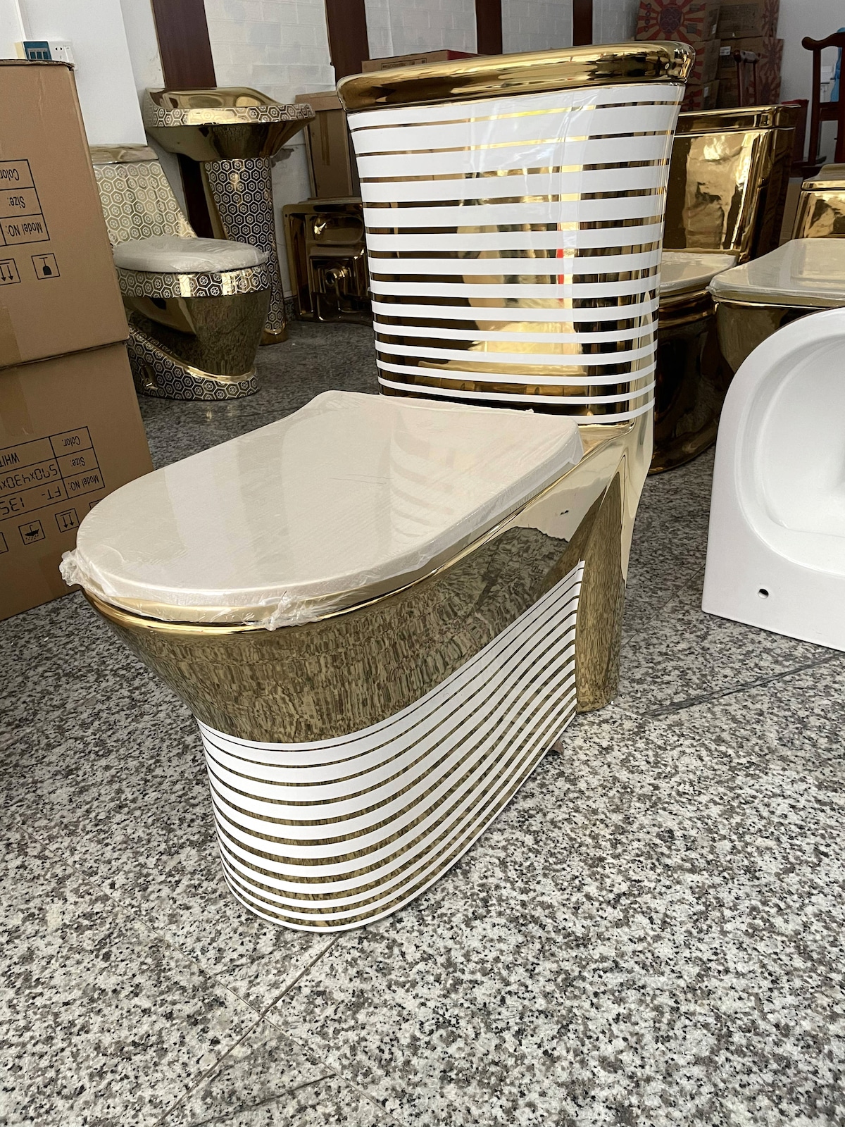 Gold Toilet With Horizontal White Patterns  -  Gold Toilets