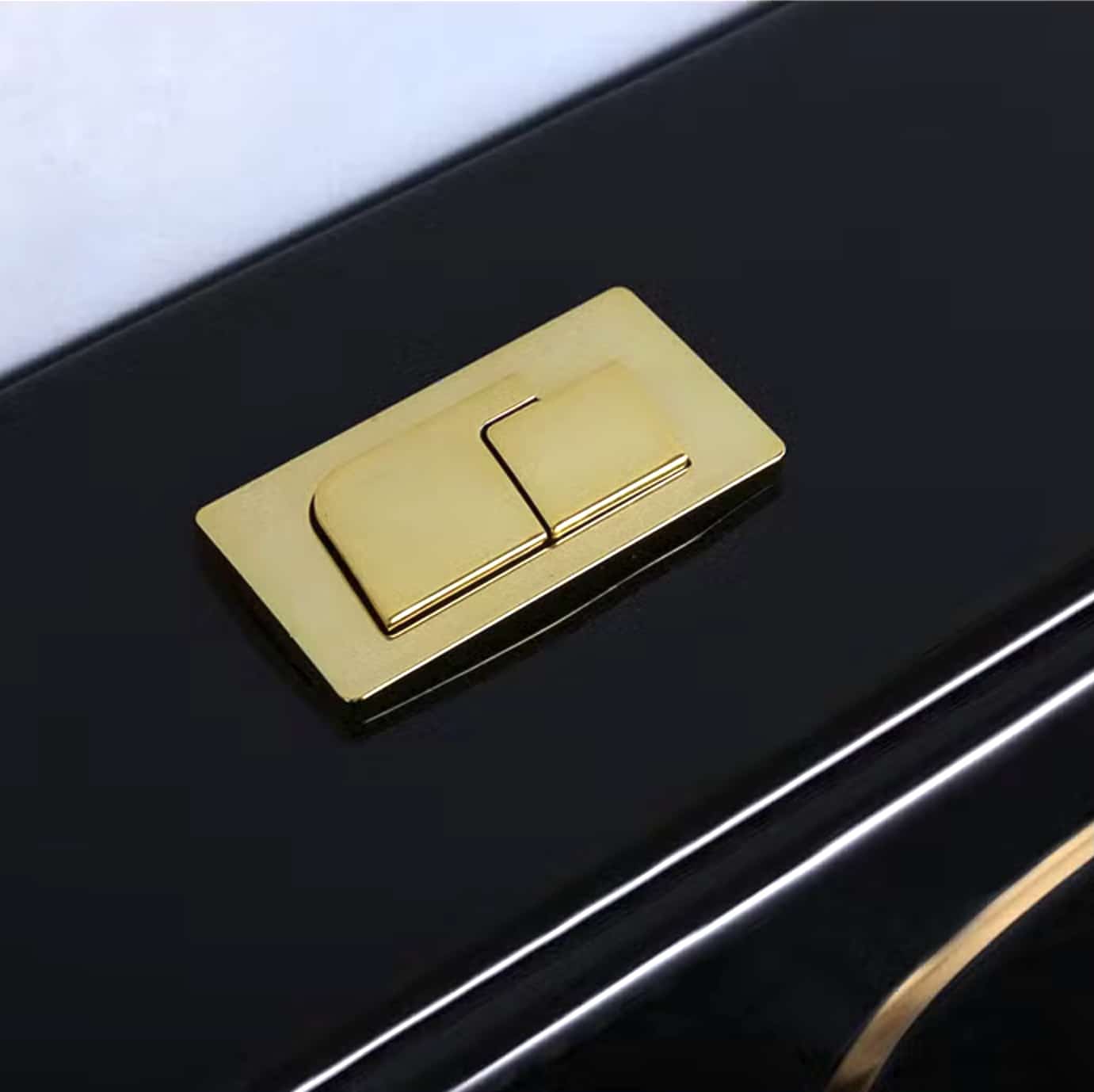 Angular Black Toilet With An Elegant Gold Stripe  -  Black Toilets